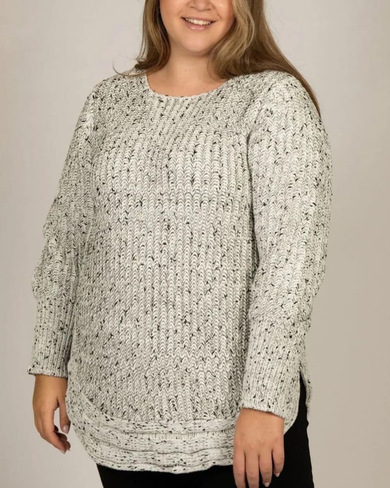 Front of a model wearing a size 1X Elodie Mix Ribbed Knit Mix Sweater in Ivory by ANNICK. | dia_product_style_image_id:352279